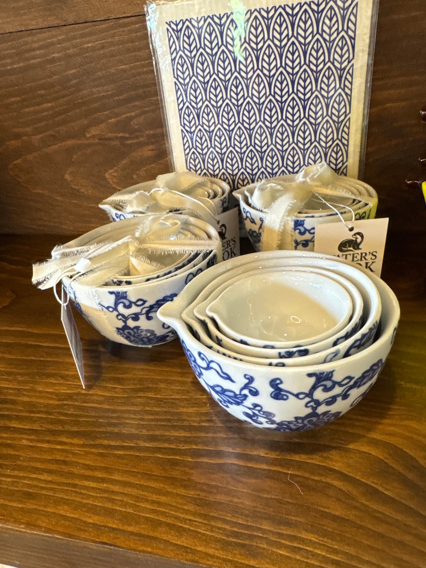 S/4 BLUE FLORAL MEAS. CUPS